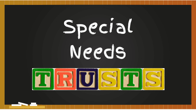 Text written on a chalkboard reads "Special Needs Trusts"