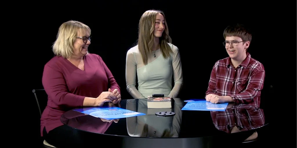 a photo of 3 women in a news studio