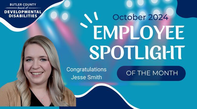 A graphic with a spotlight and a headshot of female smiling with text that reads, "Congratulations Jesse Smith, October 2024 Employee Spotlight of the Month."